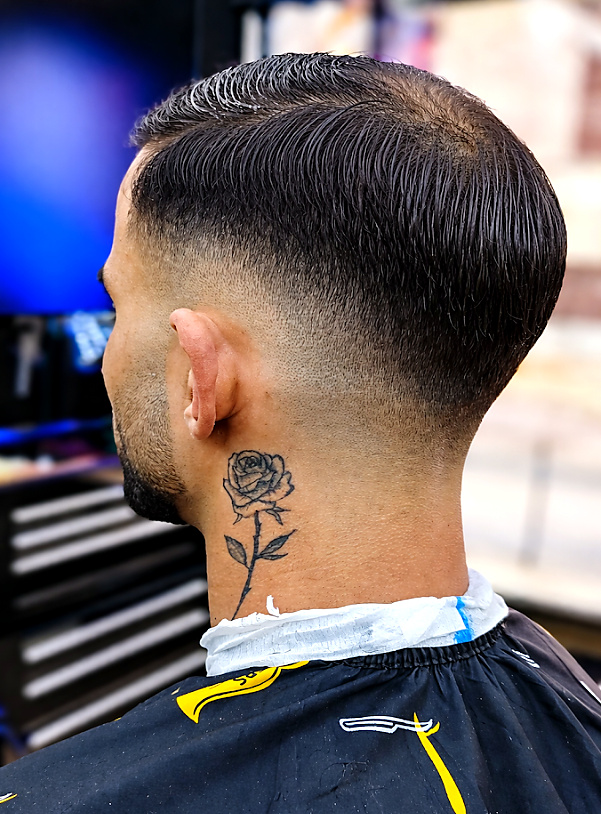 Coupe et dégradé précis réalisés par Farouk